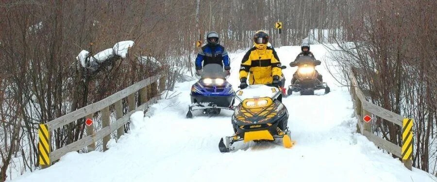 5 Places in the Lower Peninsula to Plan Your Next Snowmobile Trip