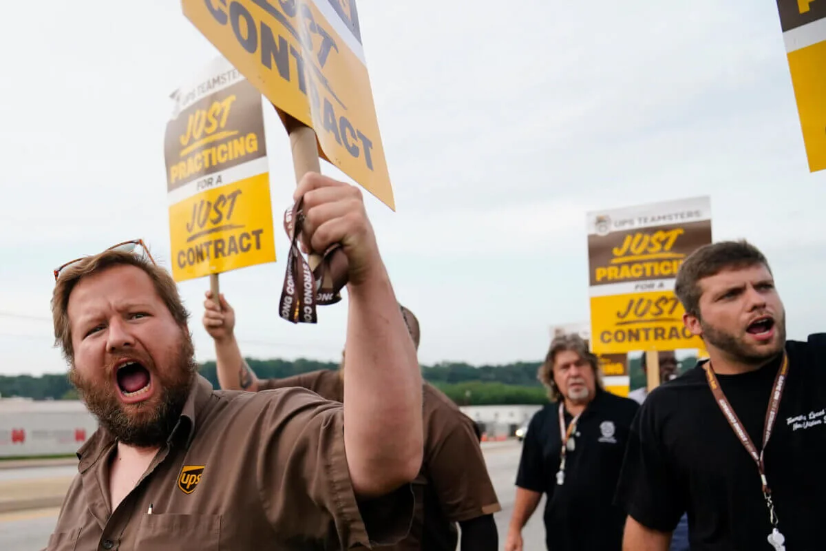 Teamsters and UPS Reach Tentative Deal to Avoid Strike, 340,000 Workers to Get Raises Teamsters and UPS Reach Tentative Deal to Avoid Strike, 340,000 Workers to Get Raises