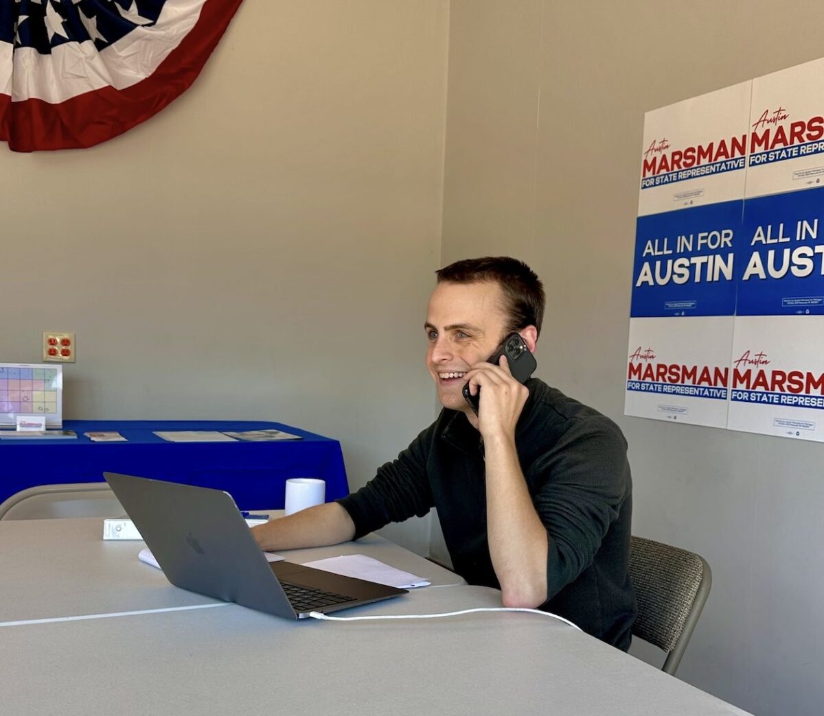 Photo of Austin Marsman, running for State Representative, making phone calls in campaign office