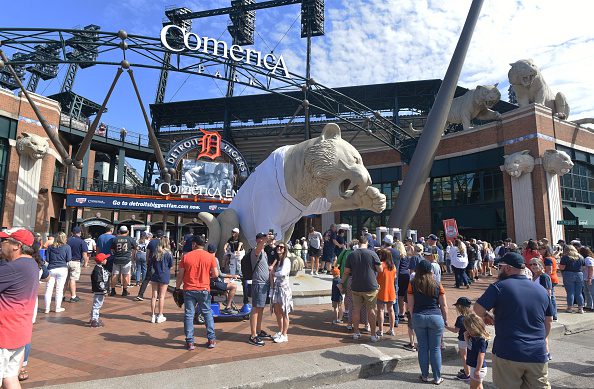 Fans line up outside of the main entrance to Comerica Park prior to the game between the Detroit Tigers and the Cleveland Guardians at Comerica Park. Catching a Tigers game is one of the best things to do in Detroit.
