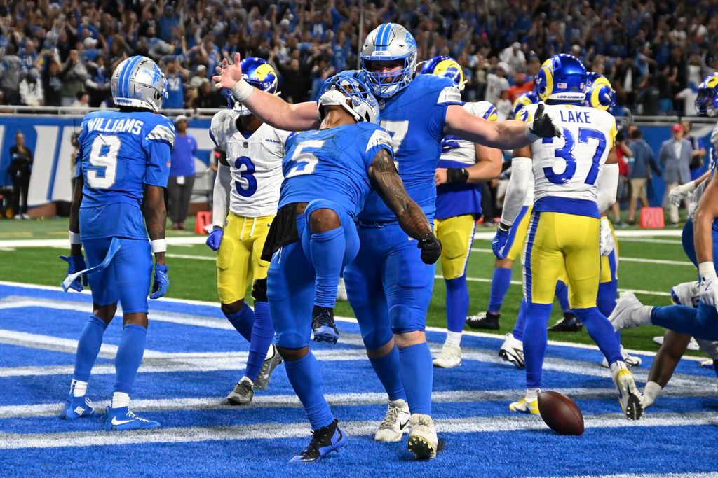 Montgomery’s 1-yard touchdown run in OT lifts Lions to 26-20 win over Rams