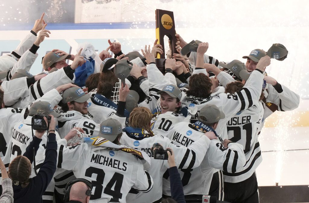 Western Michigan wins its 1st Frozen Four hockey title, beating Boston University 6-2