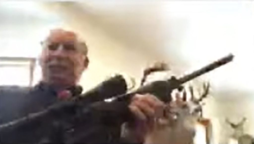 Pandemic-era lawsuit over gun at Michigan Zoom meeting is settled for $100,000