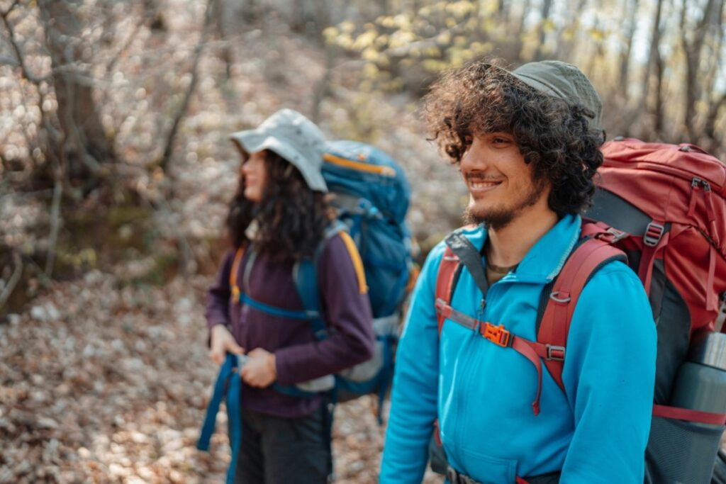 man and woman hiking