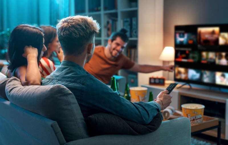 people watching a movie together