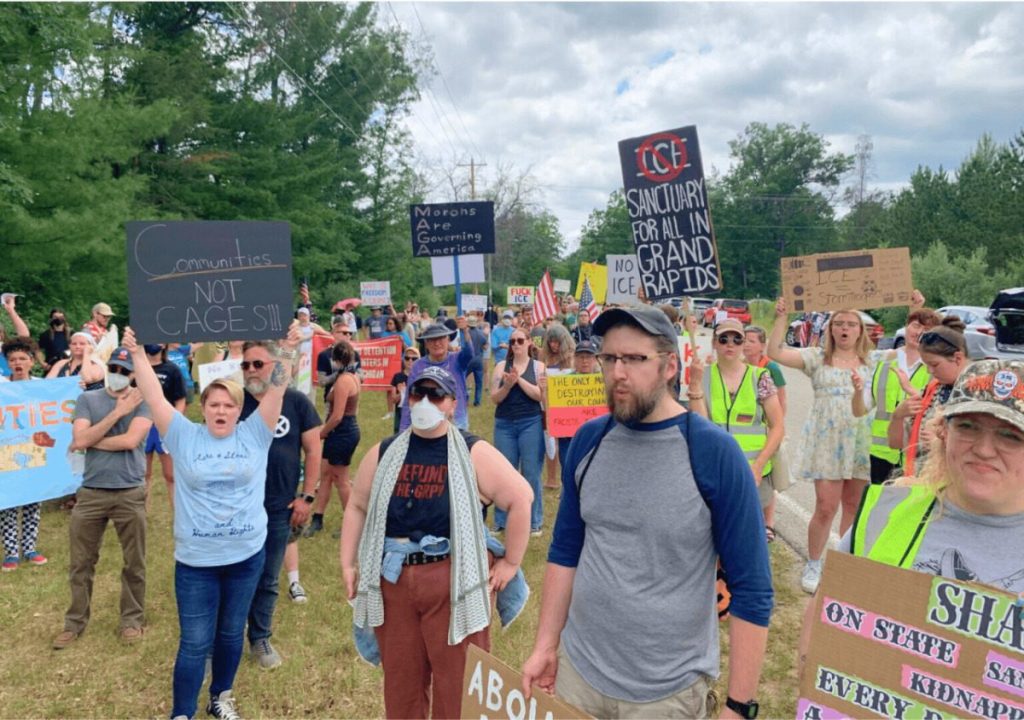 Demonstrators gather on Independence Day to protest ICE detention center in Baldwin