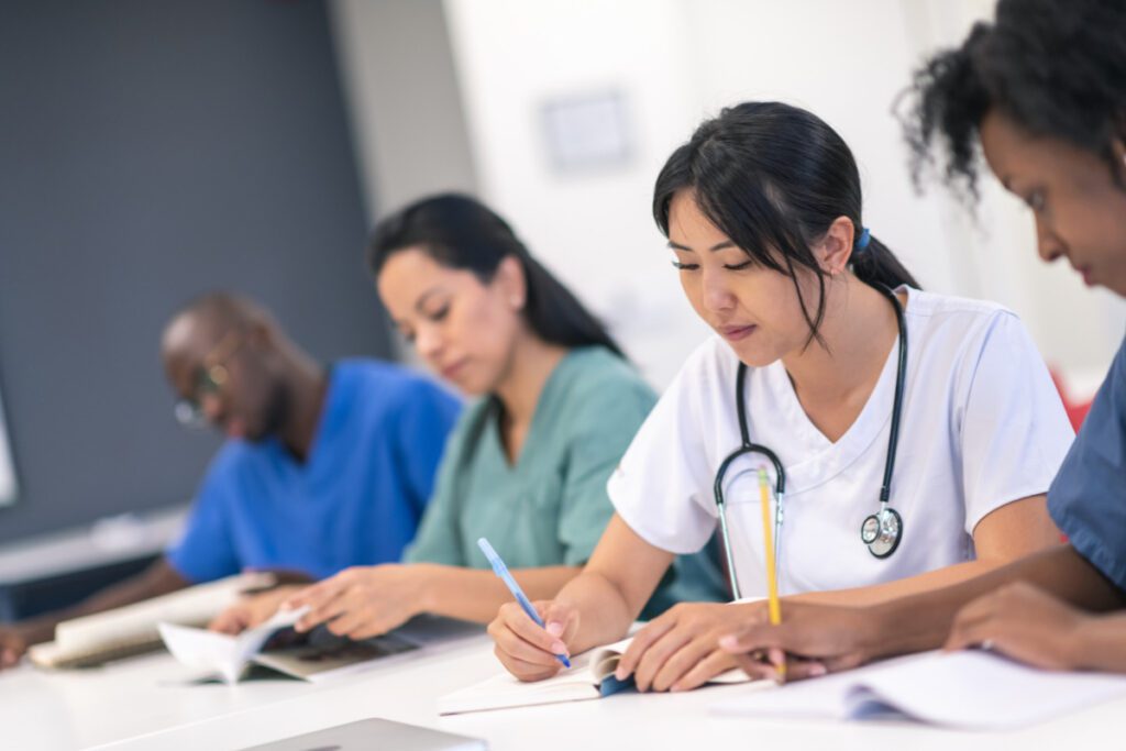 Grad Plus Loans - Medical students in class