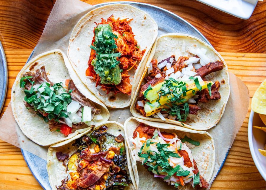 A taco platter with a variety of tacos at Donkey Taqueria, one of the best Mexican restaurants in Grand Rapids