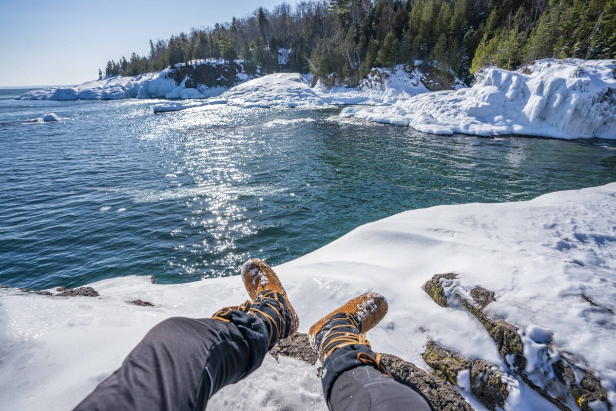 Hiking with friends at Presque Isle Park in Marquette, Michigan in winter.