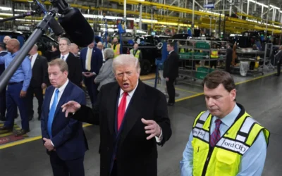 A Ford worker called out Trump. The president flipped him off. Now, he’s been suspended.