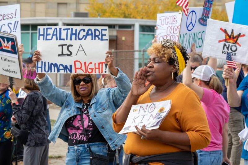Detroit, Michigan USA, 18 October 2025, Protesters from Detroit and Grosse Pointe gathered on the border between their cities for a 'No Kings' rally, protesting President Trump's actions against immigrants and against democratic institutions. (Photo by: Jim West/UCG/Universal Images Group via Getty Images)