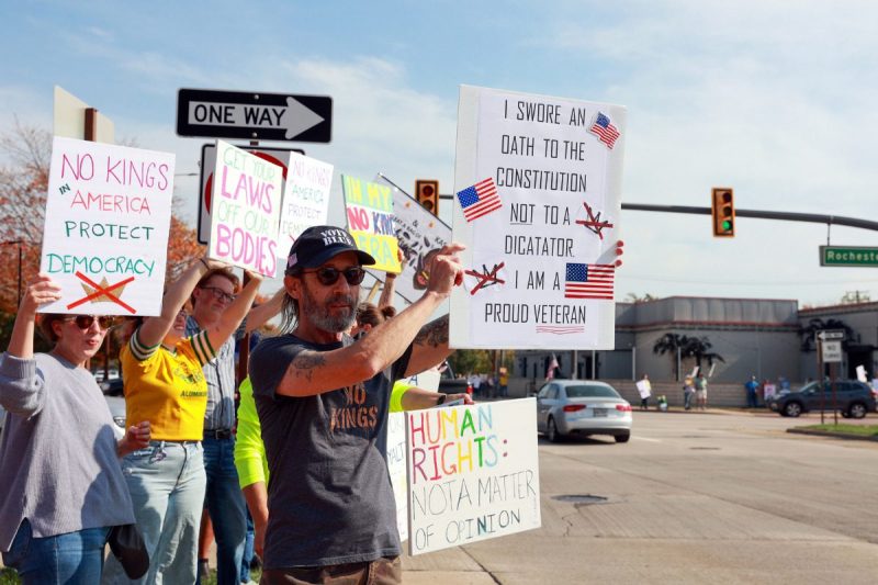 protests. DETROIT,MICHIGAN-OCTOBER 18: Protestors line the streets during a midday No Kings 2.0 protest against the Trump Administration near Gateway Park and the corner of Rochester Road and East Big Beaver Road in Troy Michigan, Michigan USA, on Saturday, October 18, 2025. (Photo by Amy Lemus/NurPhoto via Getty Images)