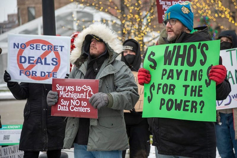 Protest Against Michigan Data Center Detroit, Michigan, Residents picket DTE Energy, opposing the electric utility's plan to provide power for a proposed $7 billion data center in rural Michigan. They fear that it could raise residential electricity rates and endanger the water supply. (Photo by: Jim West/UCG/Universal Images Group via Getty Images)