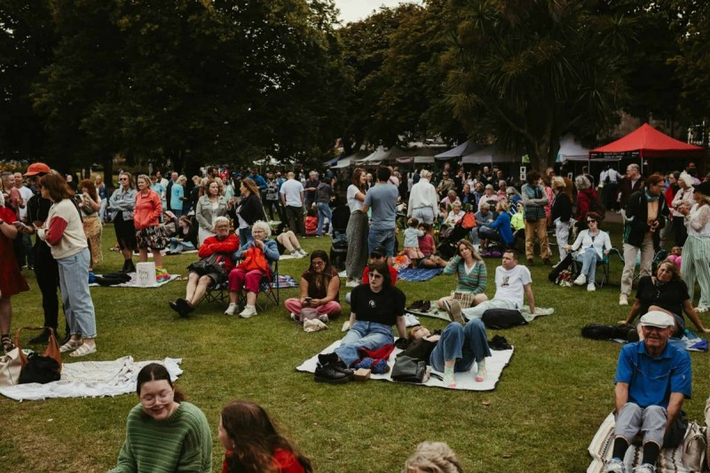 Many people gathered in a park